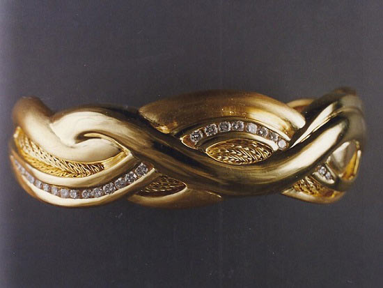 gold swirl woven bracelet