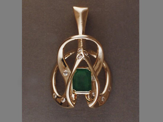emerald and diamond swirl pendant