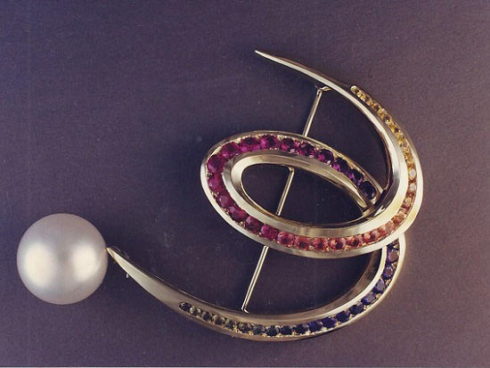 Swirl Pin With A Large South Sea Pearl & Variegated Colored Sapphires