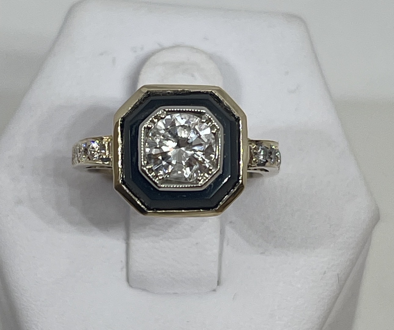 Art Deco diamond ring with black onyx octagon and yellow gold frame